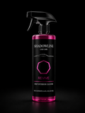 Pink and black bottle of Shadowline Car Care Revive Deep Interior Cleaner on a black background